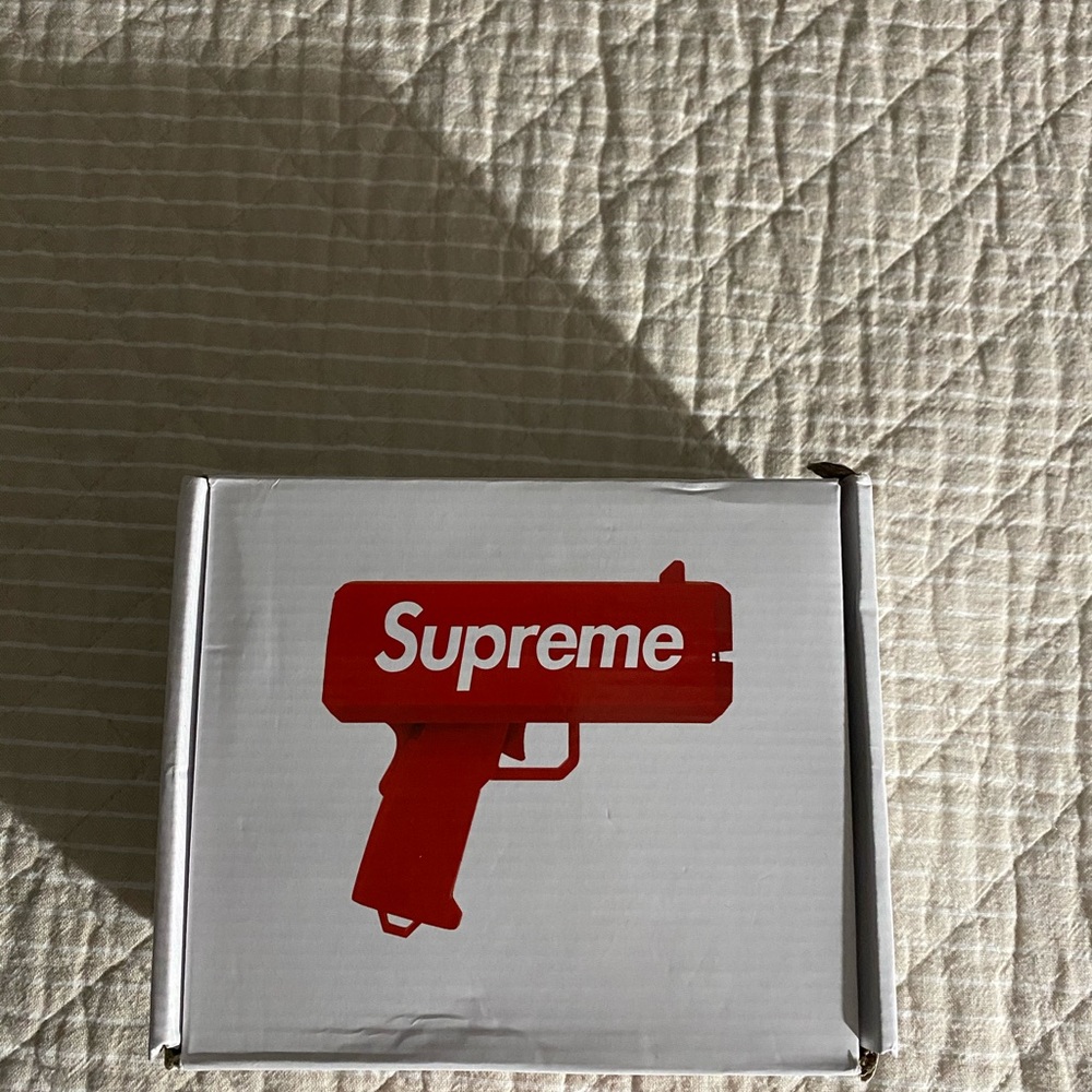 Supreme Money Gun